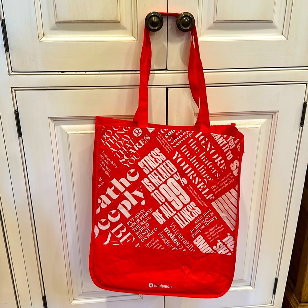 LULULEMON REUSABLE RED & WHITE LOVE TOTE BAG WITH RED HANDLES AND SNAP CLOSURE